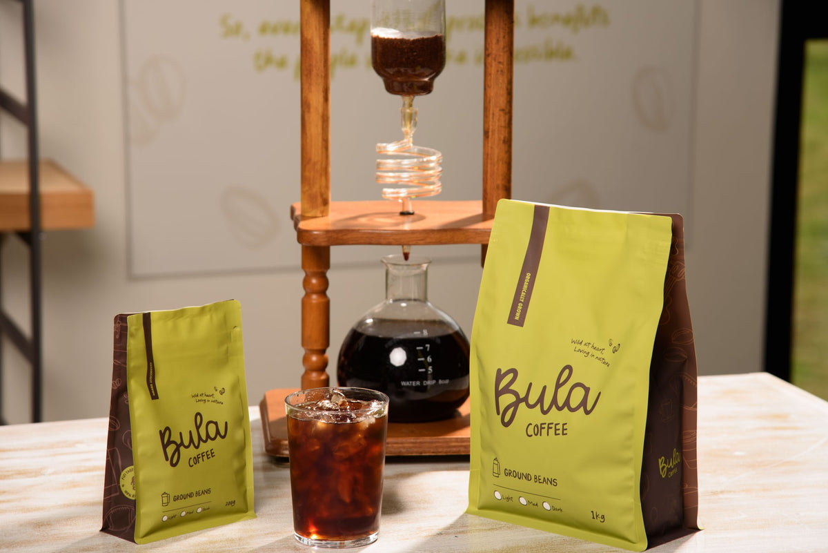 Cold drip Bula Coffee over ice with 200g and 1kg bags
